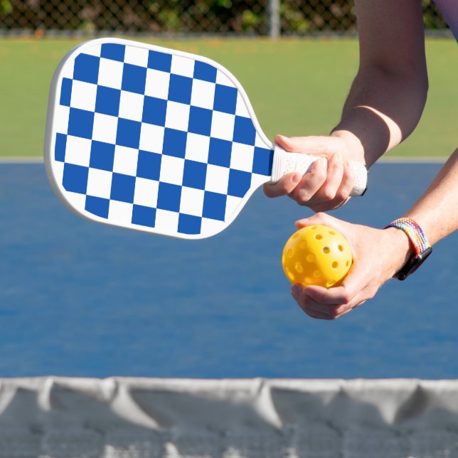 Classic cobalt blue chequerboard pickleball paddle (Insitu)