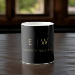 Classic Elegant Black Gold Minimalist Monogram Coffee Mug<br><div class="desc">Elevate your morning routine with our Black and Gold Modern Minimalist Monogram Name Coffee Mug. This sleek and stylish mug brings a touch of contemporary elegance to your daily coffee ritual. Crafted with quality in mind, it features a minimalist design in classic black and white, making it a versatile addition...</div>