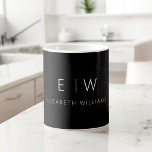 Classic Elegant Modern Minimalist Monogram Name Coffee Mug<br><div class="desc">Elevate your morning routine with our Black and White Modern Minimalist Monogram Name Coffee Mug. This sleek and stylish mug brings a touch of contemporary elegance to your daily coffee ritual. Crafted with quality in mind, it features a minimalist design in classic black and white, making it a versatile addition...</div>
