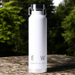 Classic Elegant Modern Minimalist Monogram Name Water Bottle<br><div class="desc">Elevate your hydration routine with our Classic Elegant Modern Minimalist Monogram Black Water Bottle. Meticulously designed, this water bottle seamlessly merges timeless sophistication with contemporary minimalism, making it a stylish and functional accessory for your daily life. Crafted with precision and attention to detail, this water bottle is more than just...</div>