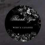 Classic Gothic Black Wedding Thank You Round Sticker<br><div class="desc">Introducing the timeless allure of our Classic Gothic Black Wedding Thank You Classic Round Sticker design, where elegance meets the ethereal. An enchanting touch of dark romance adorned with intricate botanical motifs, featuring black backgrounds embellished with lush peonies and delicate roses that exude a moody sophistication perfect for your special...</div>