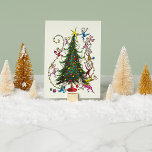 Classic Grinch | Christmas Tree Holiday Card<br><div class="desc">Send holiday cheer with this "Classic Grinch Christmas Tree" holiday card, featuring the Grinch alongside a playful Christmas tree. Inspired by How the Grinch Stole Christmas, this card brings a fun, whimsical twist to your Christmas greetings. Whether you're sending it to friends and family or sharing it with fellow Grinch...</div>