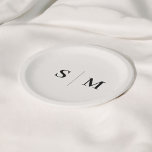 Classic Ivory Monogram Wedding Paper Plate<br><div class="desc">Enhance your wedding decor with these custom paper plates, featuring the couple’s monogram beautifully centred in an elegant serif font. The earthy beige ivory tone adds a refined, natural touch, making these plates ideal for both elegant and rustic-themed weddings. Perfect for cocktail hours, receptions, or casual wedding celebrations, these personalised...</div>