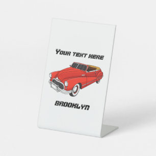 Classic red 1948 automobile pedestal sign
