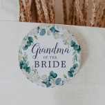 Classic White Flowers Grandma of the Bride 6 Cm Round Badge<br><div class="desc">This classic white flowers grandma of the bride button is perfect for a spring wedding shower. The elegant floral design features soft ivory and white roses,  peonies,  and chrysanthemum with touches of periwinkle blue watercolor flowers and green foliage.</div>