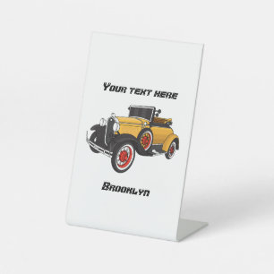 Classic yellow car 1931 pedestal sign