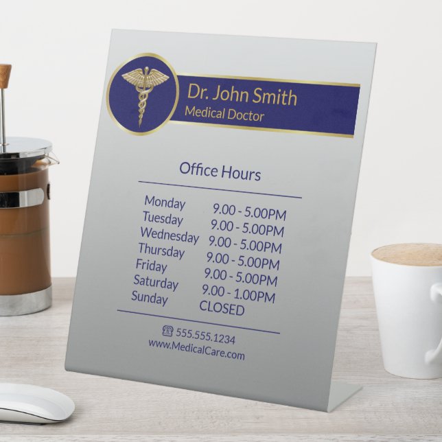 Classy Medical Gold Caduceus Blue Opening Hours Pedestal Sign (In SItu)