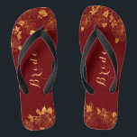 Classy Wedding Bride Deep Burgundy & Gold Foliage Flip Flops<br><div class="desc">These classy wedding Bride deep Burgundy and gold foliage flip flops have a dark burgundy background that is adorned with an intricate gold floral greenery pattern and customisable modern typography. The combination of the rich burgundy and the shimmering gold create an elegant and luxurious aesthetic. View the collection on this...</div>