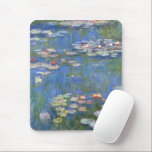 Claude Monet // Water Lilies Mouse Mat<br><div class="desc">Water Lilies is a series of approxiamately 250 oil paintings by French Impressionist Claude Monet (1840-1926). The paintings depict Monet's flower garden at Giverny and were the main focus of Monet's artistic production during the last thirty years of his life. This reproduction is high resolution and true to the original...</div>