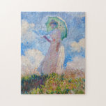 Claude Monet - Woman with a Parasol facing left Jigsaw Puzzle<br><div class="desc">Study of a Figure Outdoors,  also known as Woman with a Parasol/Umbrella facing left. By Claude Monet in 1886.</div>