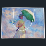 Claude Monet - Woman with a Parasol facing right Large Gift Bag<br><div class="desc">Study of a Figure Outdoors,  also known as Woman with a Parasol/Umbrella facing right. By Claude Monet in 1886.</div>