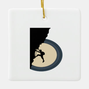 Climbing mountain man at night silhouette ceramic ornament