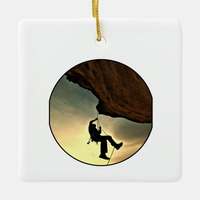 Climbing mountain man at sunset ceramic ornament (Front)