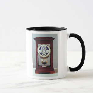 Clock with four dials and the signs of the mug