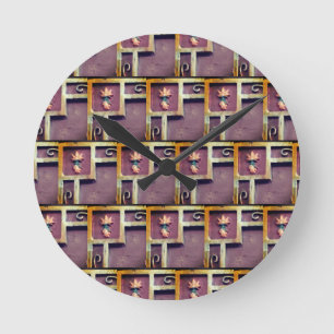 Clock with geometric design gold squares flowers