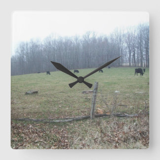 Clock with mountains and cows