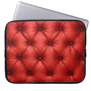 Close up background texture of scarlet red capiton laptop sleeve