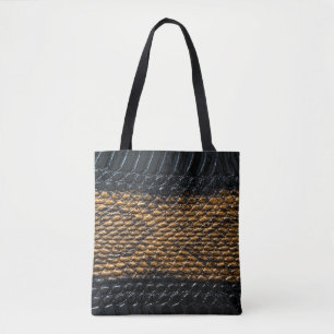 Close-up black snake skin texture tote bag