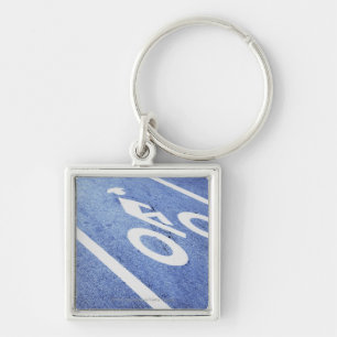 Close-up of a bicycle sign on the road key ring