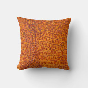 Close up of a brown reptile vintage leather textur cushion