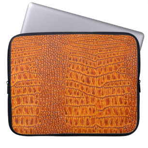 Close up of a brown reptile vintage leather textur laptop sleeve