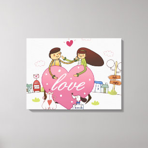 Close-up of a couple holding a heart shape canvas print