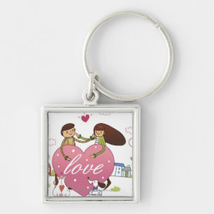 Close-up of a couple holding a heart shape key ring