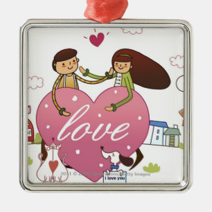 Close-up of a couple holding a heart shape metal tree decoration