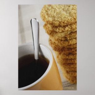 Close-up of a cup of coffee with cookies poster