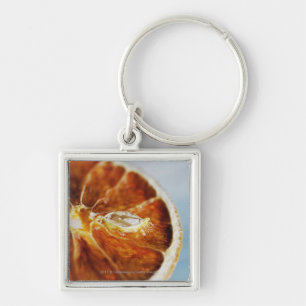 Close-up of a dried slice of lemon key ring