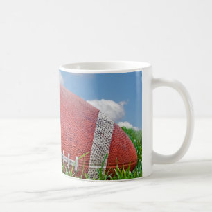 Close-up of a Football In Grass Coffee Mug
