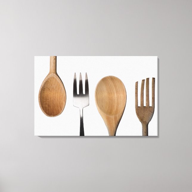 Close-up of a fork with a wooden spoon canvas print (Front)