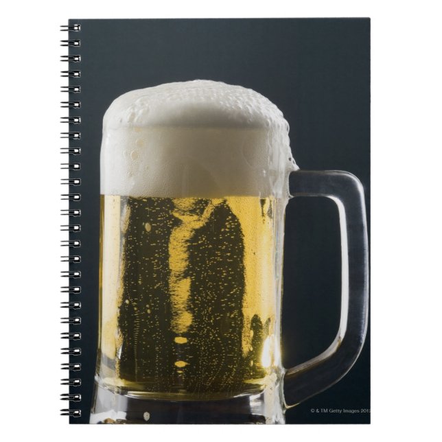 Close-up of a glass of beer notebook (Front)
