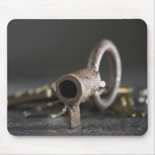 Close-up of a key in a key ring mouse mat