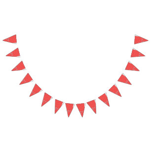Close-up of a red and black patterned fabric, fe bunting