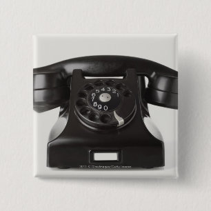 Close-up of a rotary phone 15 cm square badge
