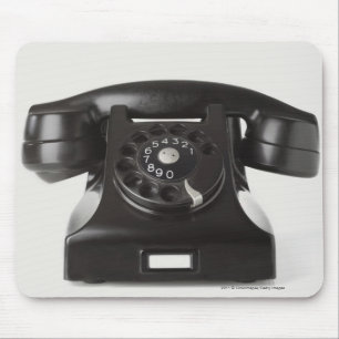 Close-up of a rotary phone mouse mat