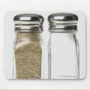 Close-up of a salt and a pepper shaker mouse mat