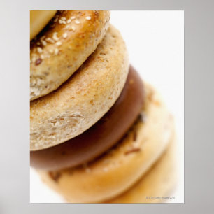 Close-up of a stack of assorted bagels poster
