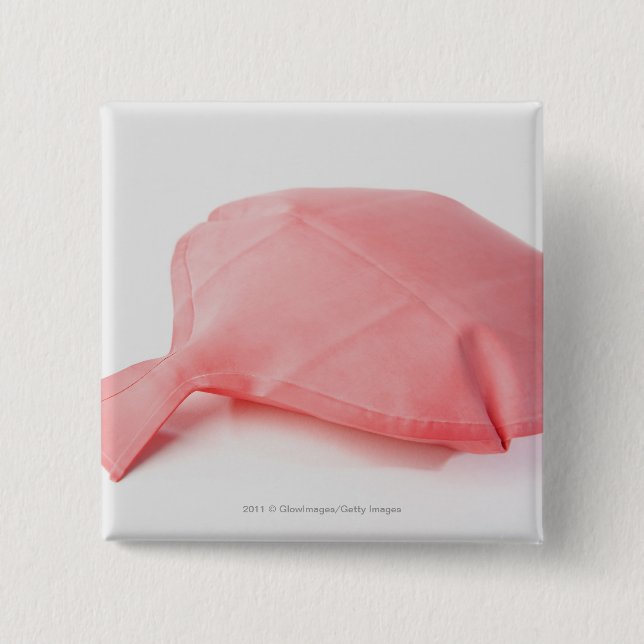 Close-up of a whoopee cushion 15 cm square badge (Front)