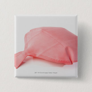 Close-up of a whoopee cushion 15 cm square badge