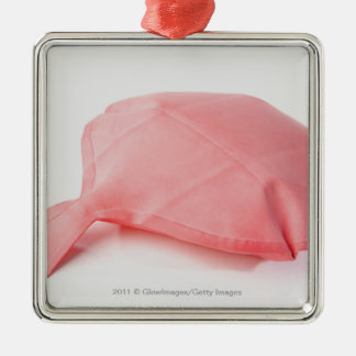 Close-up of a whoopee cushion metal tree decoration