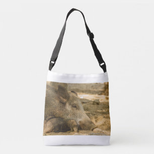 close-up of a wild boar on crossbody bag