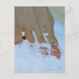 Close-up of a woman's foot in salt postcard