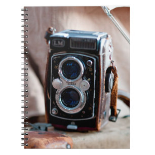 Close-up of an antique camera notebook