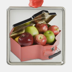 Close-up of apples in a box metal tree decoration