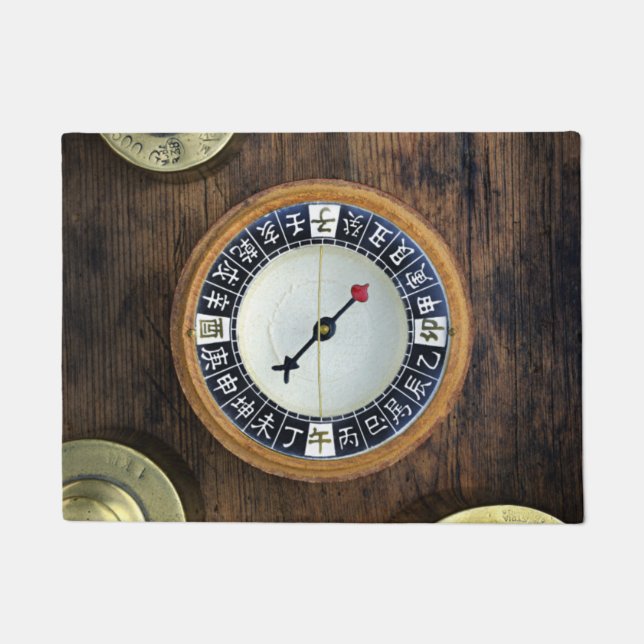 Close Up Of Chinese Compass And Gold Weights Doormat (Front)