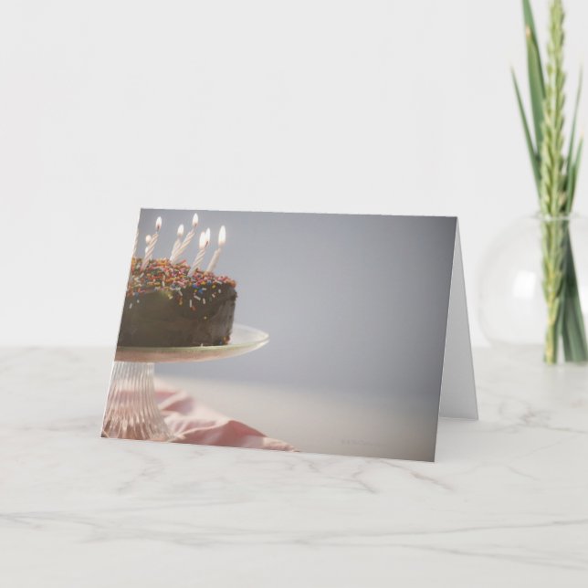 Close up of chocolate birthday cake with candles card (Front)