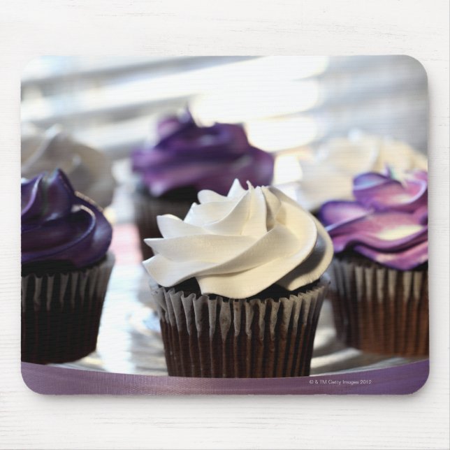 Close-up of cupcakes with selective focus on mouse mat (Front)