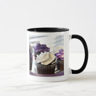 Close-up of cupcakes with selective focus on mug